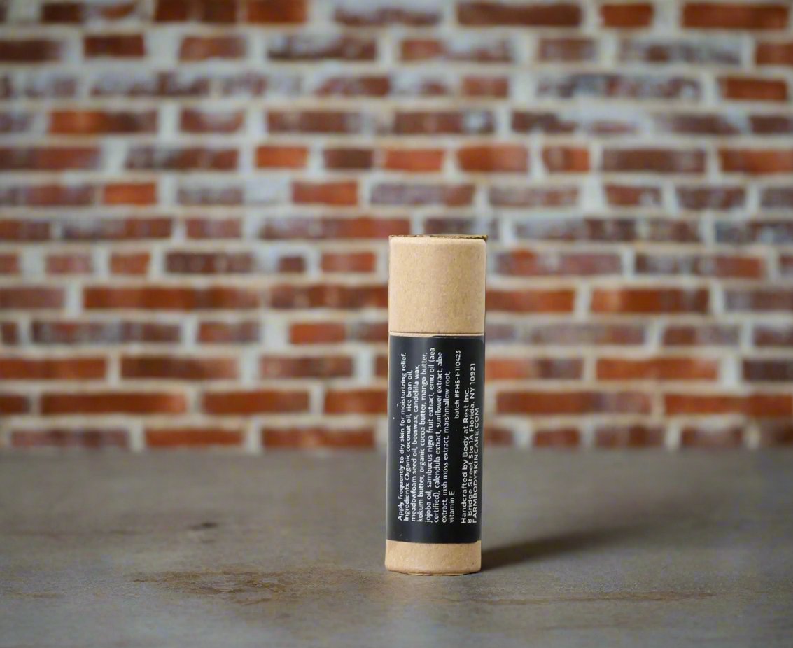 Farm Hand botanical Balm Stick Ingredients with emu oil to help with dry sensitive skin and splits and cracks