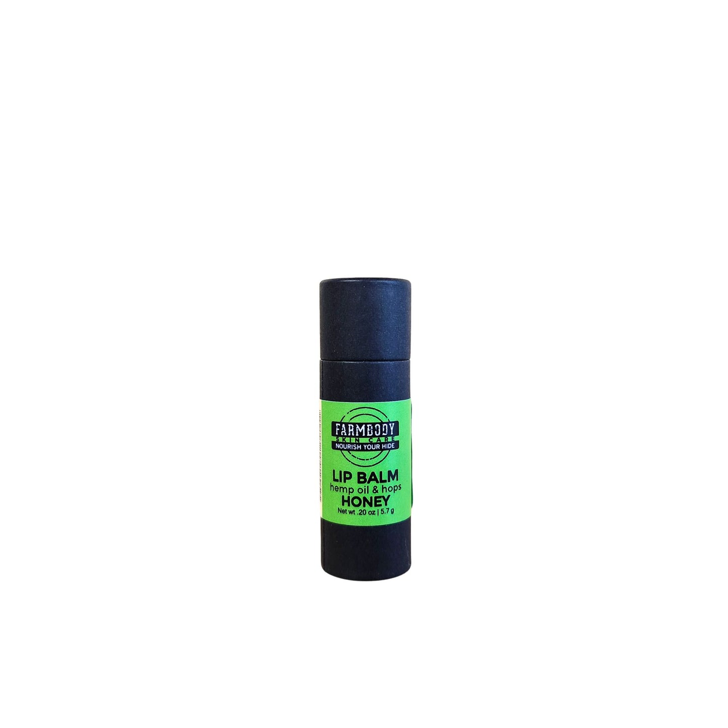 Honey and Hops Lip balm in hemp oil shown in black biodegradable packaging from farmbody skin care.