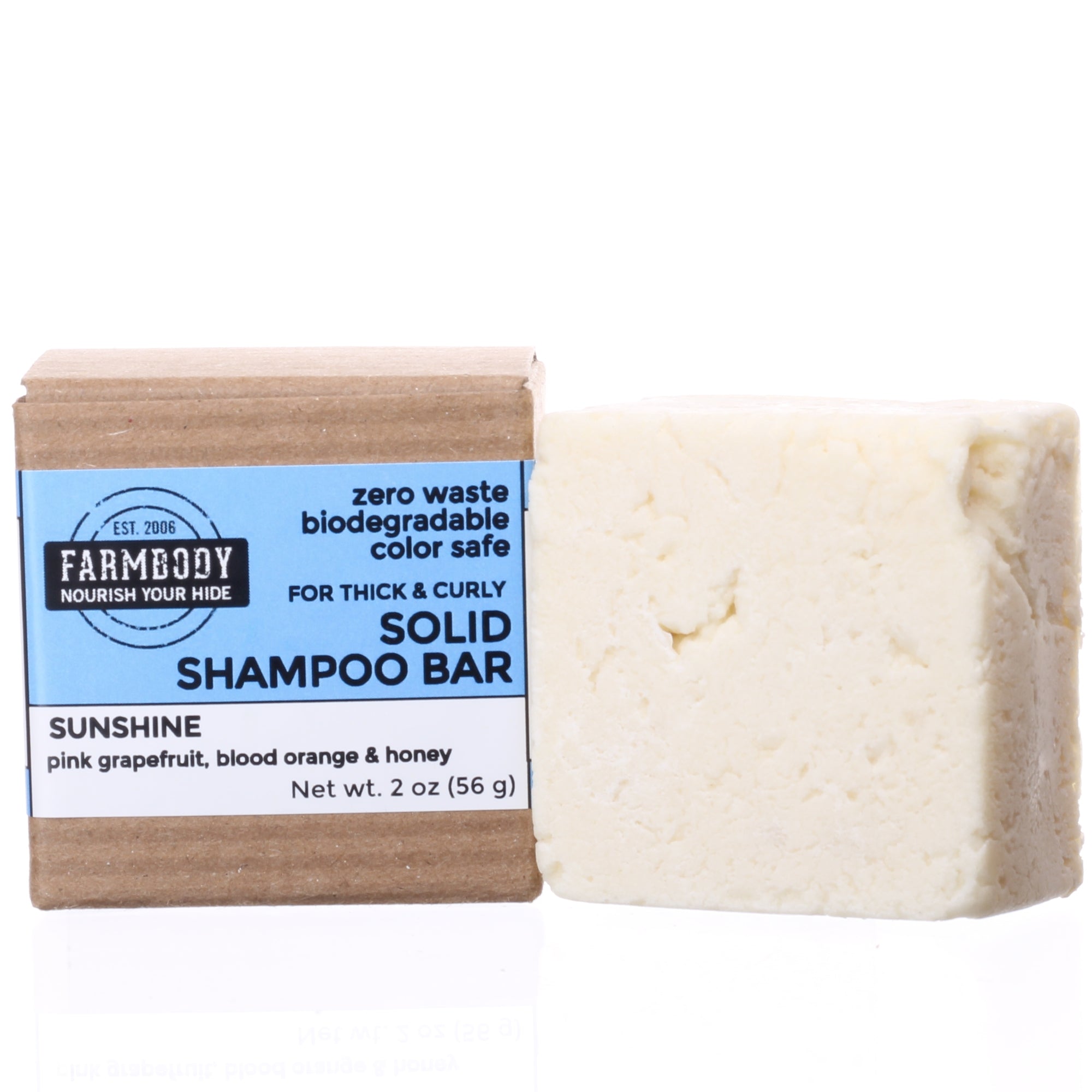 Farmbody Solid Shampoo Bar for thick and curly and ethnic hair in sunshine which is pink grapefruit blood orange and honey. Safe for color treated hair and free of cocamidopropyl betaine