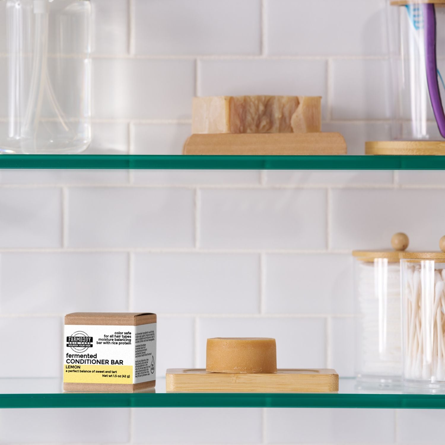 Silicone Free Hair Conditioner Bar shown in lemon on a bathroom shelf