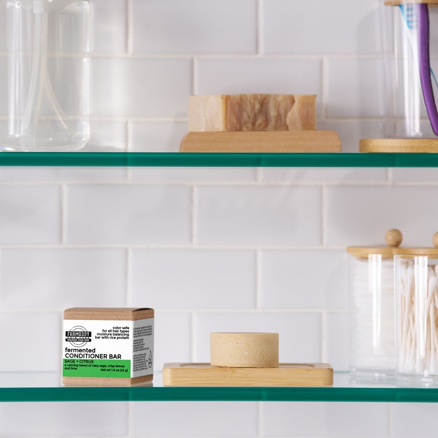fermented conditioner bar good for 70 uses shown on a bathroom shelf for sensitive scalps in sage and citrus scent