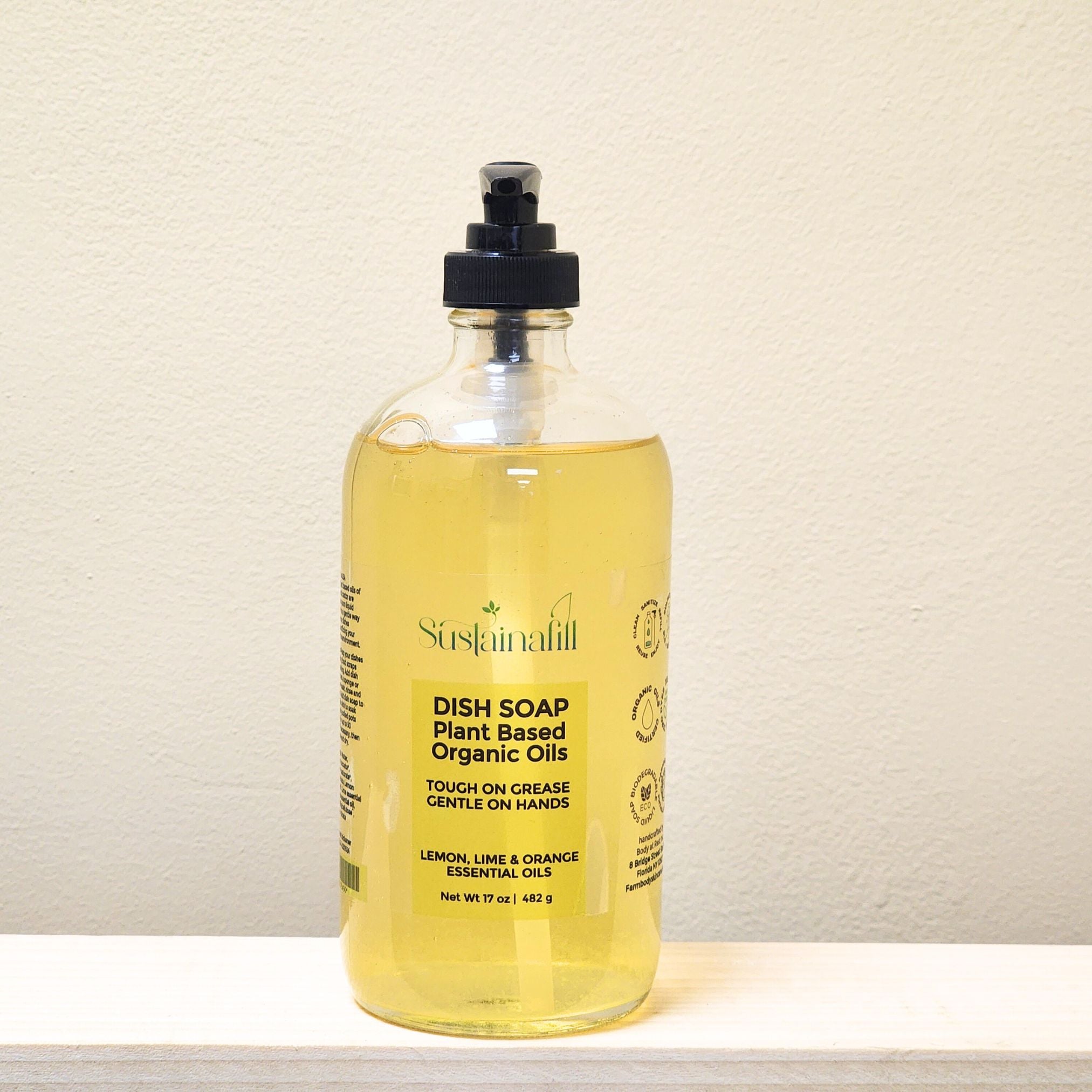 handcrafted plant based liquid dish soap with oranges, lemons and lime essential oils to cut grease